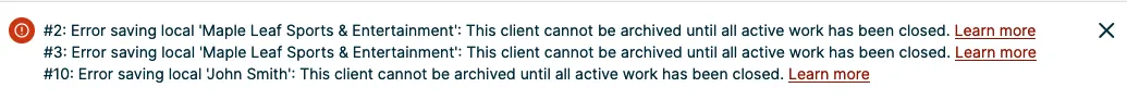 banner message indicating two clients couldn't be imported since they have active work