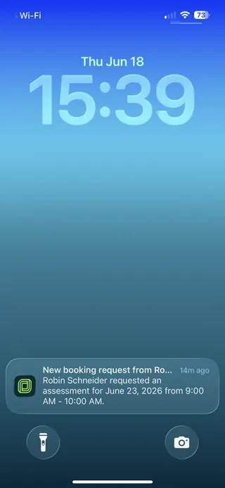 A screen capture of a smartphone push notification for a new booking request.
