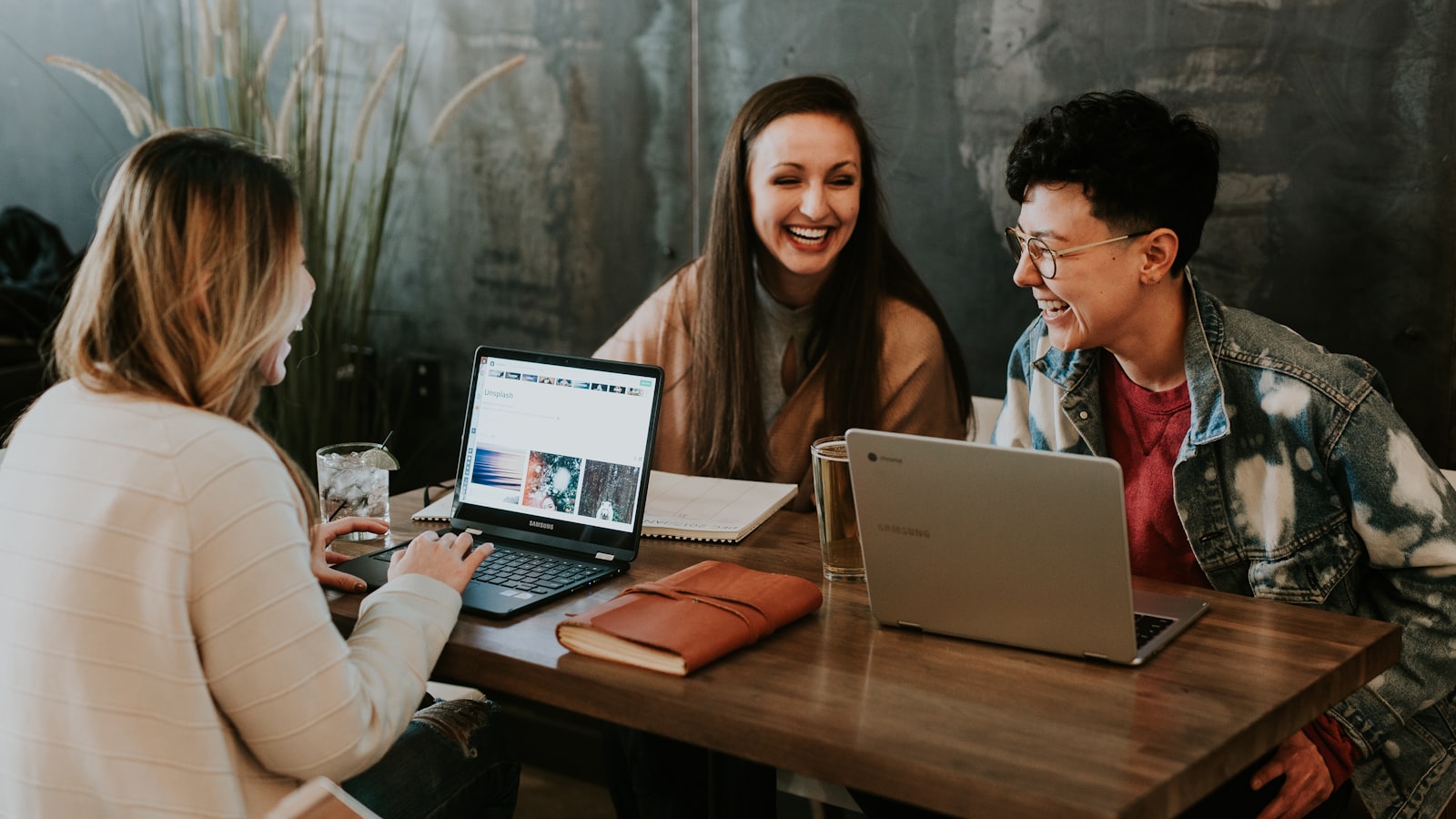 Team collaborating at a laptop